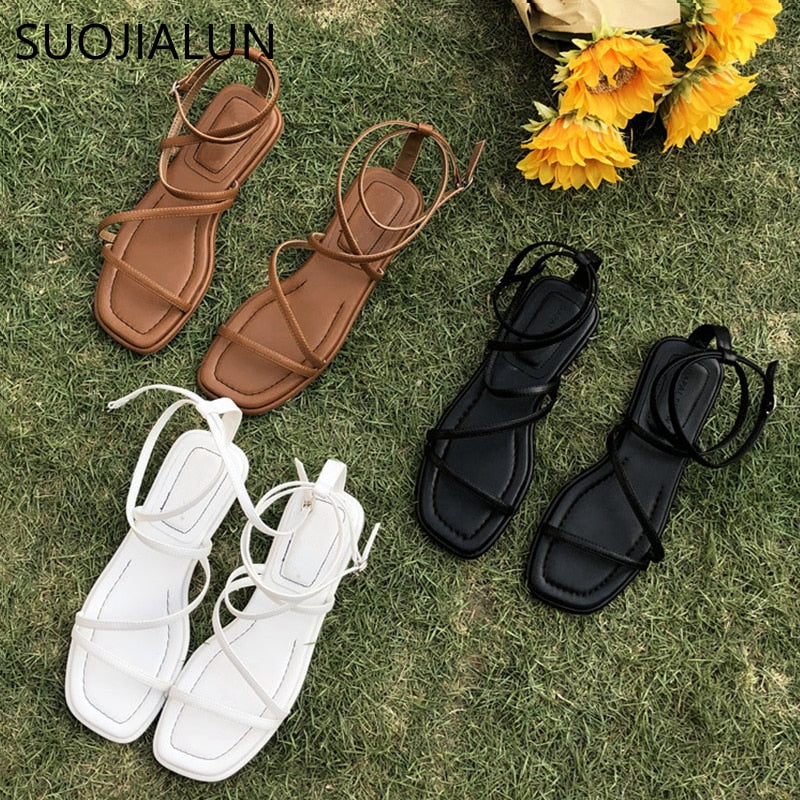 SUOJIALUN New Fashion Women Sandals Flat Heel Narrow Band Back Strap Summer Gladiator Shoes Ladies Casual Summer Beach Slides